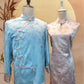 Couple Set: Light Blue Chinese Silk Tang Shirt with Pink Jacquard Cuffs, Trimming and Full Frog Buttons and Pink Jacquard Cheongsam with Gold Trimming