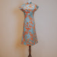 Green and orange jacquard cheongsam with pointed sleeves