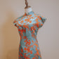 Green and orange jacquard cheongsam with pointed sleeves